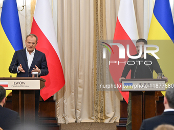 President of Ukraine Volodymyr Zelenskyy and Polish Prime Minister Donald Tusk are pictured during a joint press conference at the Potocki P...