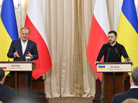 President of Ukraine Volodymyr Zelenskyy and Polish Prime Minister Donald Tusk are pictured during a joint press conference at the Potocki P...