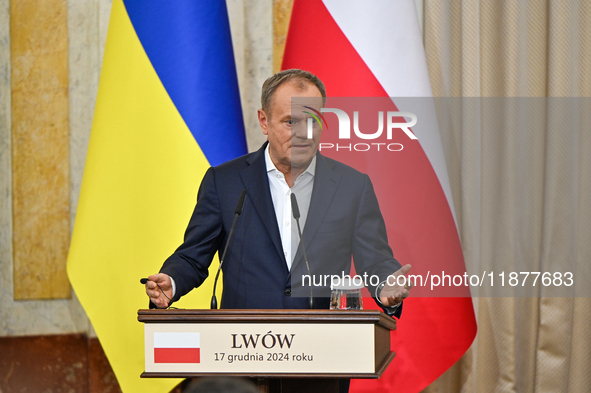 In Lviv, Ukraine, on December 17, 2024, Polish Prime Minister Donald Tusk speaks during a joint press conference with President of Ukraine V...