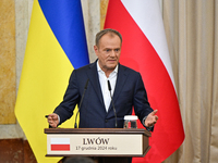 In Lviv, Ukraine, on December 17, 2024, Polish Prime Minister Donald Tusk speaks during a joint press conference with President of Ukraine V...