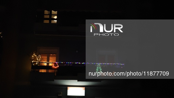 A balcony in Athens, Greece, on December 16, 2024, is decorated with Christmas lights. 