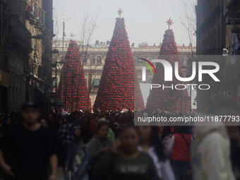 A view of a Christmas Village in the Zocalo of Mexico City, Mexico, on December 17, 2024. (