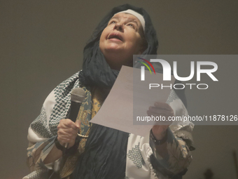 Members of the Nur Ashki Jerrahi Sufi Community and Tekke in Mexico City, Mexico, on December 17, 2024, pay tribute through a ritual to the...