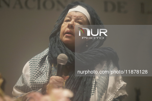 Members of the Nur Ashki Jerrahi Sufi Community and Tekke in Mexico City, Mexico, on December 17, 2024, pay tribute through a ritual to the...