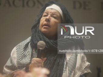 Members of the Nur Ashki Jerrahi Sufi Community and Tekke in Mexico City, Mexico, on December 17, 2024, pay tribute through a ritual to the...