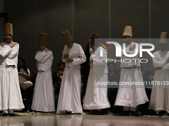 Members of the Nur Ashki Jerrahi and Tekke Sufi Community in Mexico City, Mexico, on December 17, 2024, pay tribute through a Sufi ritual an...