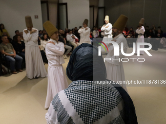 Members of the Nur Ashki Jerrahi and Tekke Sufi Community in Mexico City, Mexico, on December 17, 2024, pay tribute through a Sufi ritual an...