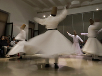 Members of the Nur Ashki Jerrahi and Tekke Sufi Community in Mexico City, Mexico, on December 17, 2024, pay tribute through a Sufi dance to...