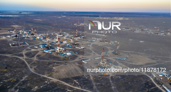 Drilling rigs work in the Gobi Desert in Karamay, China, on July 17, 2024. 