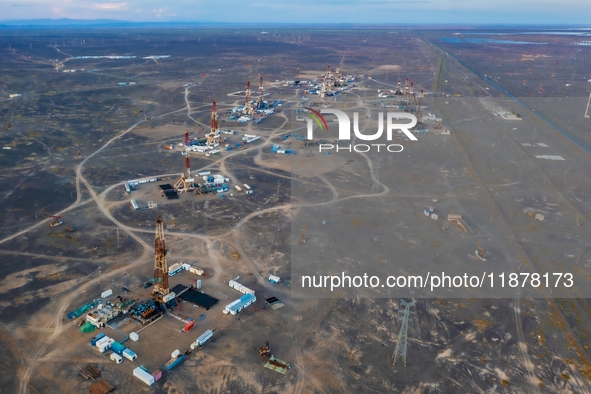 Drilling rigs work in the Gobi Desert in Karamay, China, on July 17, 2024. 