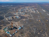 Drilling rigs work in the Gobi Desert in Karamay, China, on July 17, 2024. (