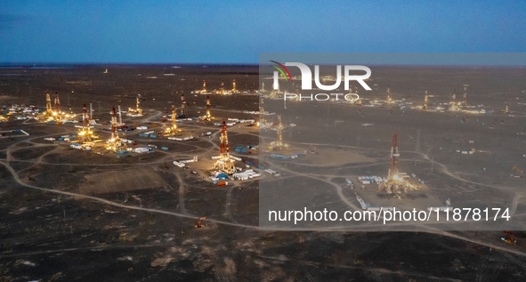 Drilling rigs work in the Gobi Desert in Karamay, China, on July 17, 2024. 