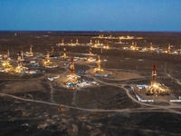 Drilling rigs work in the Gobi Desert in Karamay, China, on July 17, 2024. (