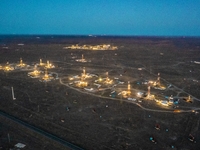 Drilling rigs work in the Gobi Desert in Karamay, China, on July 17, 2024. (