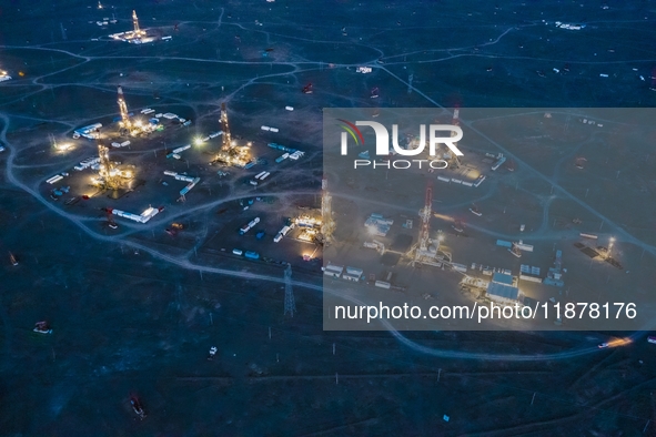 Drilling rigs work in the Gobi Desert in Karamay, China, on July 17, 2024. 