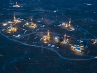 Drilling rigs work in the Gobi Desert in Karamay, China, on July 17, 2024. (