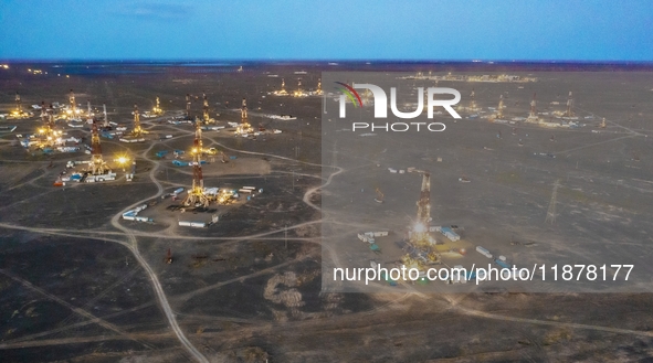 Drilling rigs work in the Gobi Desert in Karamay, China, on July 17, 2024. 