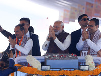 Prime Minister Narendra Modi is with Rajasthan Chief Minister Bhajan Lal Sharma and Rajasthan BJP President Madan Rathore during the 'Ek Var...