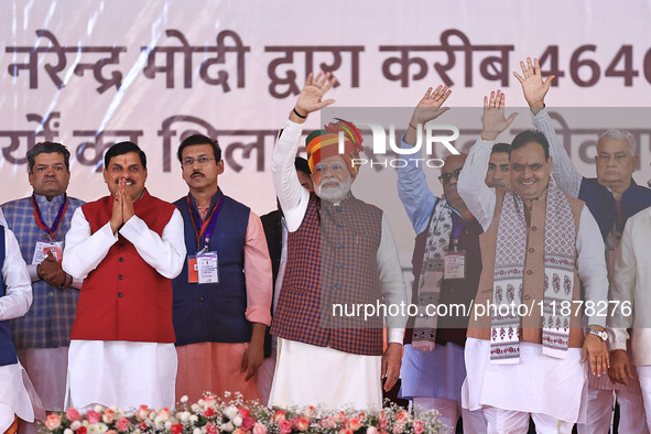 Prime Minister Narendra Modi is with Rajasthan Chief Minister Bhajan Lal Sharma and Madhya Pradesh Chief Minister Mohan Yadav during the 'Ek...