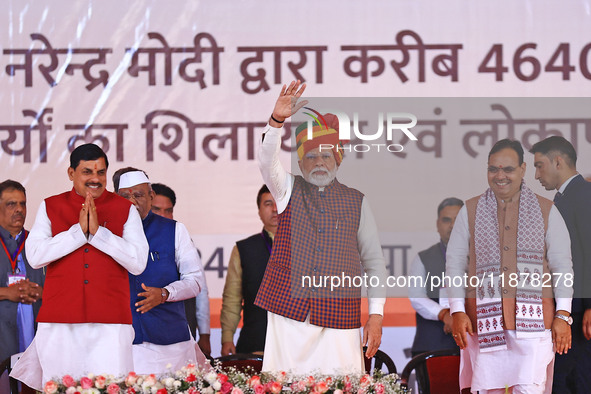 Prime Minister Narendra Modi is with Rajasthan Chief Minister Bhajan Lal Sharma and Madhya Pradesh Chief Minister Mohan Yadav during the 'Ek...