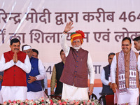 Prime Minister Narendra Modi is with Rajasthan Chief Minister Bhajan Lal Sharma and Madhya Pradesh Chief Minister Mohan Yadav during the 'Ek...