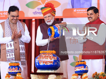 Prime Minister Narendra Modi is with Rajasthan Chief Minister Bhajan Lal Sharma and Madhya Pradesh Chief Minister Mohan Yadav during the 'Ek...