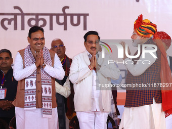 Prime Minister Narendra Modi arrives at the 'Ek Varsh-Parinaam Utkarsh' event, marking the completion of one year of the Rajasthan governmen...