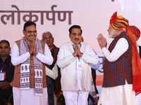 Prime Minister Narendra Modi arrives at the 'Ek Varsh-Parinaam Utkarsh' event, marking the completion of one year of the Rajasthan governmen...