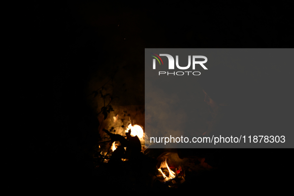 Nepalese people warm themselves by bonfires to protect themselves from the cold. Due to fog, the cold increases day by day, and the mercury...