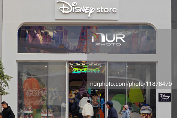 Customers shop at a newly opened Disney store on Nanjing Road Pedestrian Street in Shanghai, China, on December 18, 2024. 