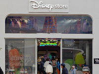 Customers shop at a newly opened Disney store on Nanjing Road Pedestrian Street in Shanghai, China, on December 18, 2024. (