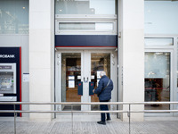 A Eurobank Bank branch is in Athens, Greece, on December 18, 2024. Greek lenders face an impact of about 350 million euros ($368 million) in...