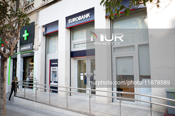 A Eurobank Bank branch is in Athens, Greece, on December 18, 2024. Greek lenders face an impact of about 350 million euros ($368 million) in...