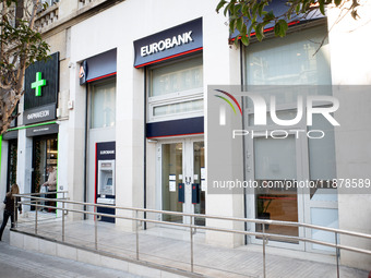 A Eurobank Bank branch is in Athens, Greece, on December 18, 2024. Greek lenders face an impact of about 350 million euros ($368 million) in...