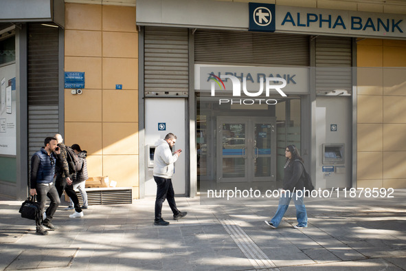 An Alpha Bank branch is in Athens, Greece, on December 18, 2024. Greek lenders face an impact of about 350 million euros ($368 million) in 2...