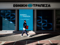 An Ethniki Bank branch is in Athens, Greece, on December 18, 2024. Greek lenders face an impact of about 350 million euros ($368 million) in...