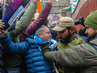 Members of the youth wing of the Indian National Congress party shout slogans and hold placards during a protest in Srinagar, Jammu and Kash...