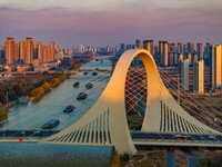 Transport ships sail on the Beijing-Hangzhou Grand Canal in Huai'an City, Jiangsu Province, China, on December 18, 2024. (