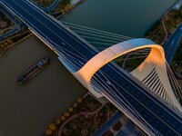 Transport ships sail on the Beijing-Hangzhou Grand Canal in Huai'an City, Jiangsu Province, China, on December 18, 2024. (