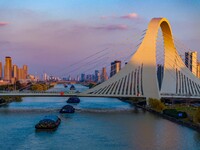 Transport ships sail on the Beijing-Hangzhou Grand Canal in Huai'an City, Jiangsu Province, China, on December 18, 2024. (