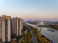 Transport ships sail on the Beijing-Hangzhou Grand Canal in Huai'an City, Jiangsu Province, China, on December 18, 2024. (