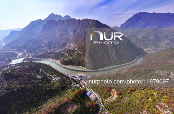 Vehicles drive on the Guzhao water highway in Xingshan County, Yichang City, Central China's Hubei Province, on December 18, 2024. 