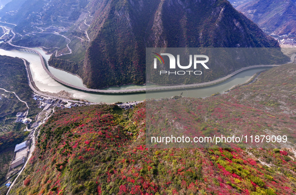 Vehicles drive on the Guzhao water highway in Xingshan County, Yichang City, Central China's Hubei Province, on December 18, 2024. 