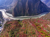 Vehicles drive on the Guzhao water highway in Xingshan County, Yichang City, Central China's Hubei Province, on December 18, 2024. (