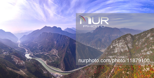 Vehicles drive on the Guzhao water highway in Xingshan County, Yichang City, Central China's Hubei Province, on December 18, 2024. 