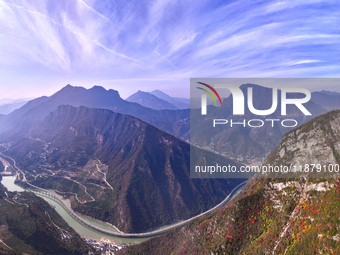 Vehicles drive on the Guzhao water highway in Xingshan County, Yichang City, Central China's Hubei Province, on December 18, 2024. (