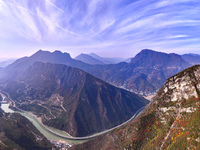 Vehicles drive on the Guzhao water highway in Xingshan County, Yichang City, Central China's Hubei Province, on December 18, 2024. (