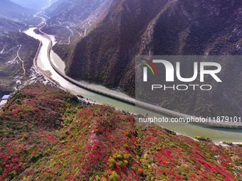 Vehicles drive on the Guzhao water highway in Xingshan County, Yichang City, Central China's Hubei Province, on December 18, 2024. (