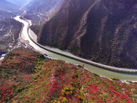 Vehicles drive on the Guzhao water highway in Xingshan County, Yichang City, Central China's Hubei Province, on December 18, 2024. (