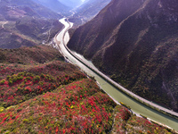 Vehicles drive on the Guzhao water highway in Xingshan County, Yichang City, Central China's Hubei Province, on December 18, 2024. (